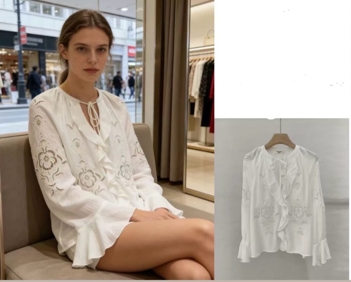 Blusa blanca bordada con volantes